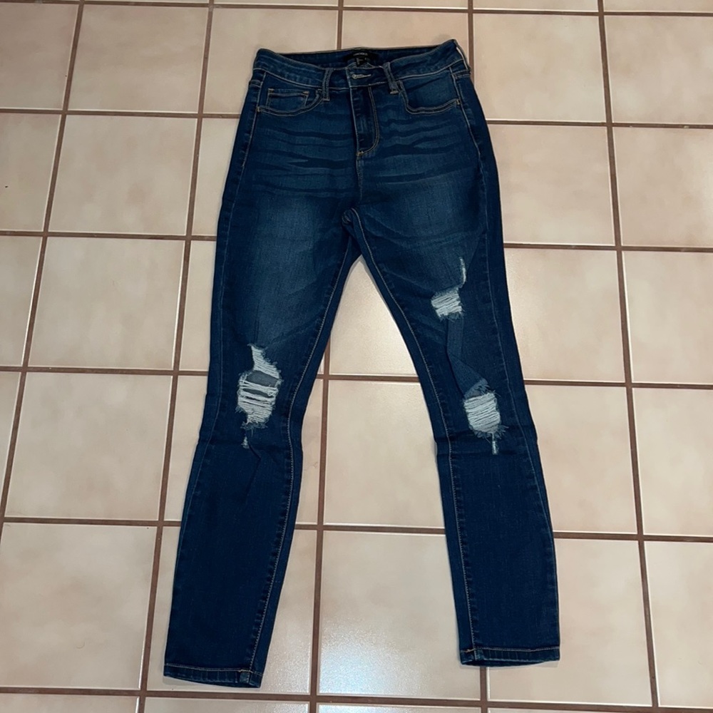 Dark denim ripped skinny jeans